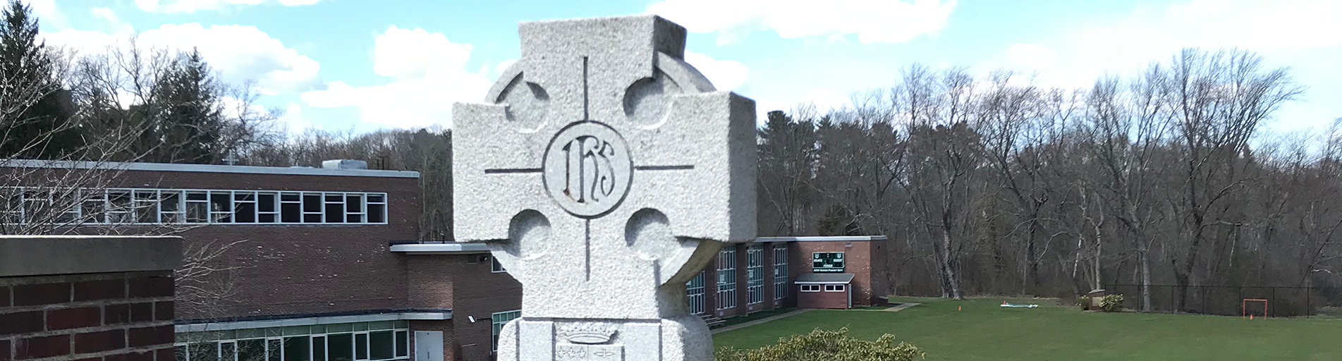 cross on the outside school grounds